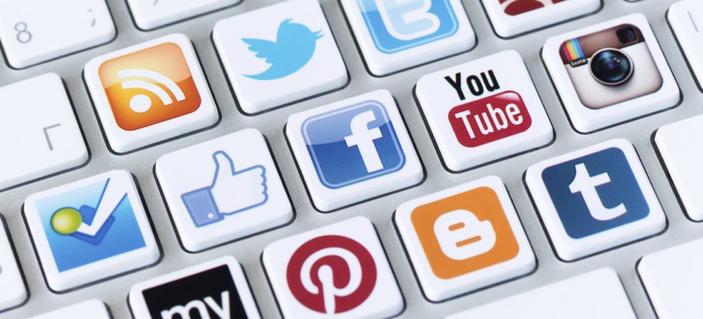 Buttons on a keyboard represent the major social media platforms