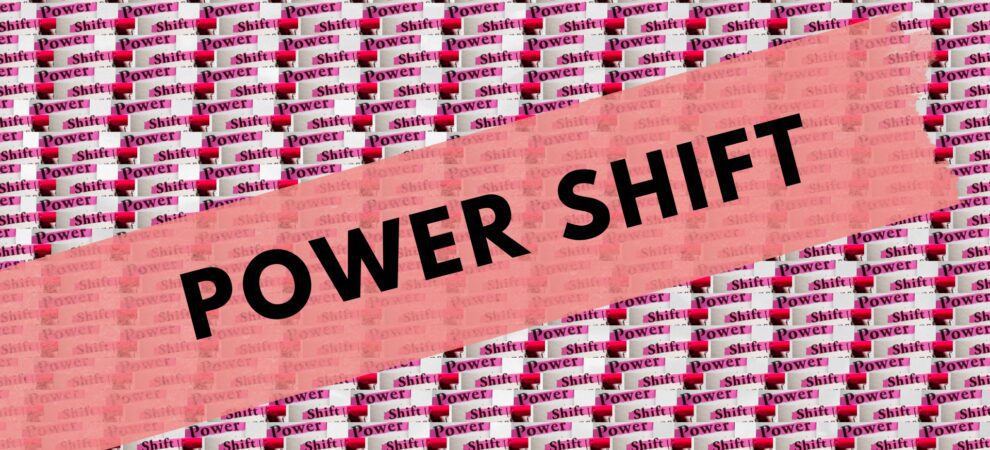 The words "POWER SHIFT" in large black text displayed across a repeated background made up of "power shift" in a smaller font.